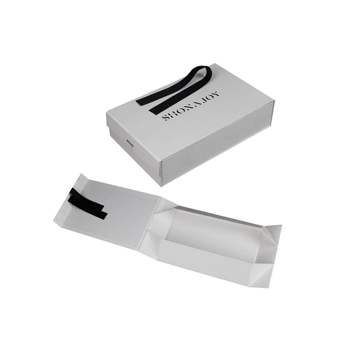 Collapsible rigid packaging boxes